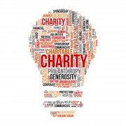 Charity word cloud concept with enovative light bulb symbol.